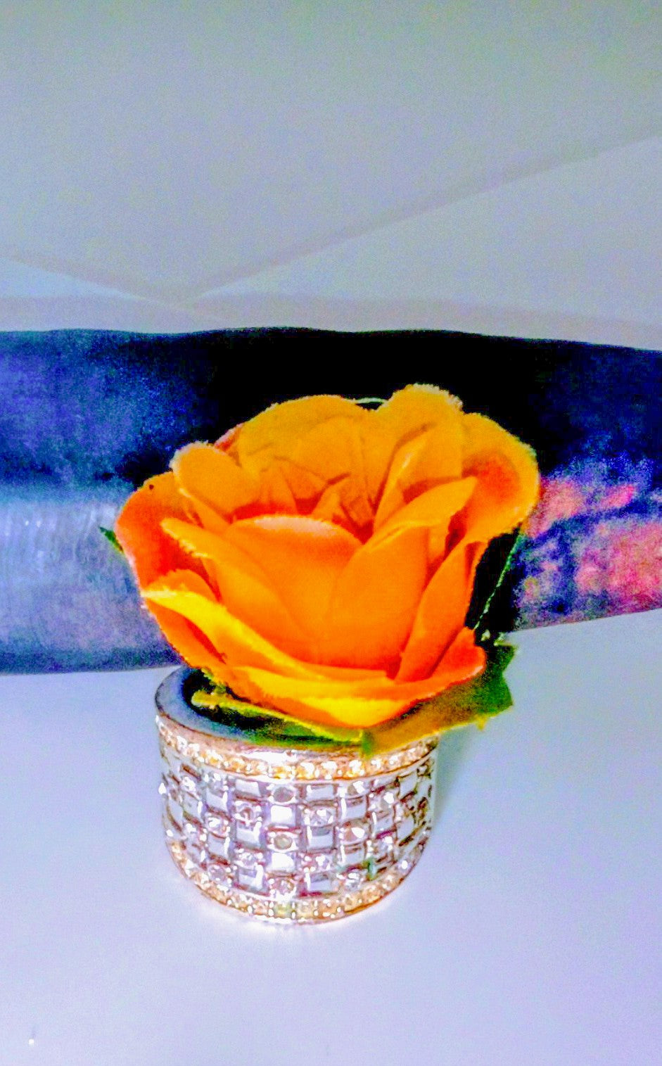 Golden 3 carat total weight Baguette Moissanite Diamonds in a gold and silver band.