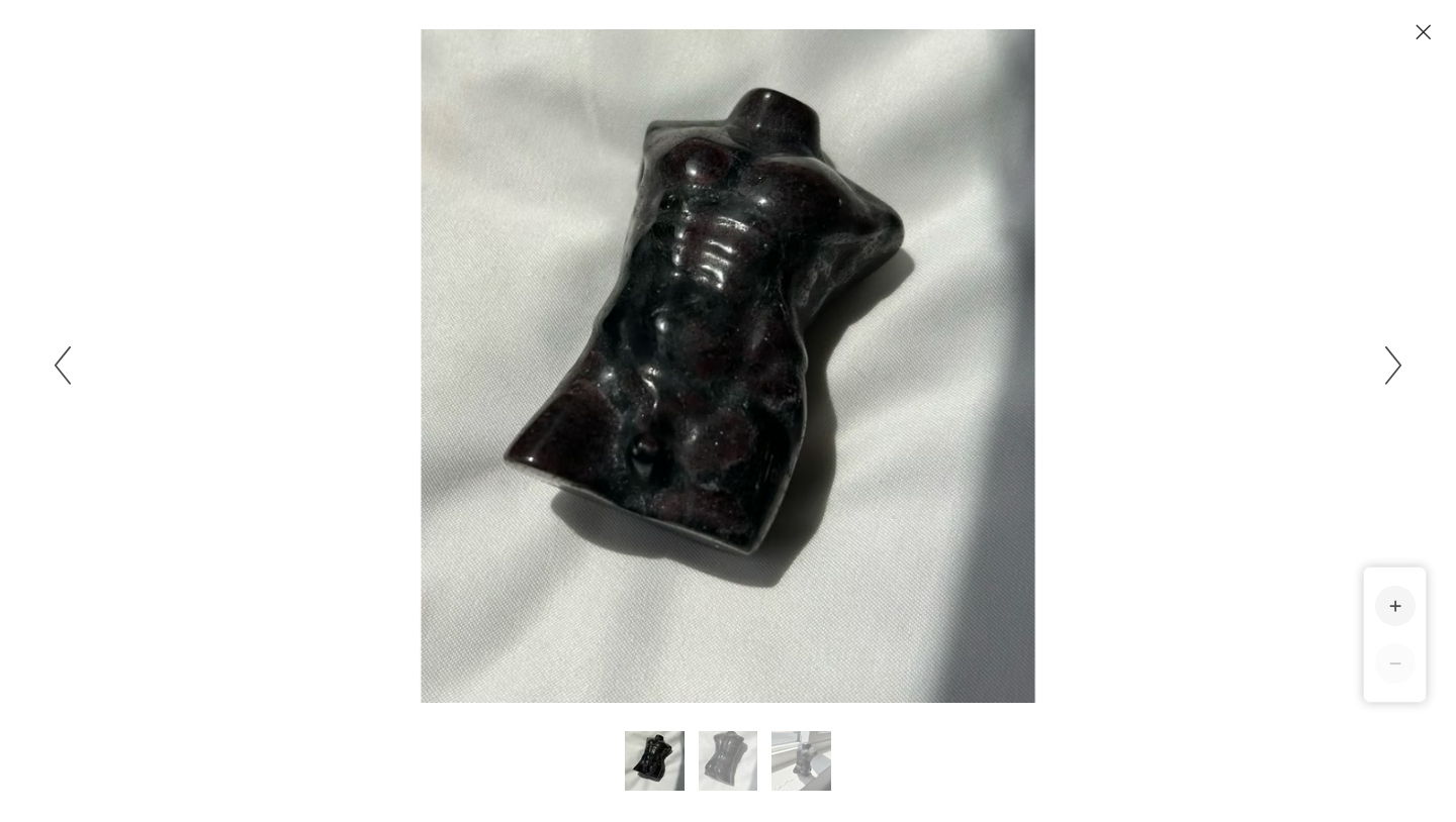 Hand carved garnet male figurine