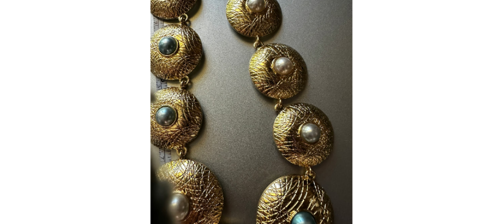 YLL WITH THE LABEL Gold 14" coin shaped necklace or belt.