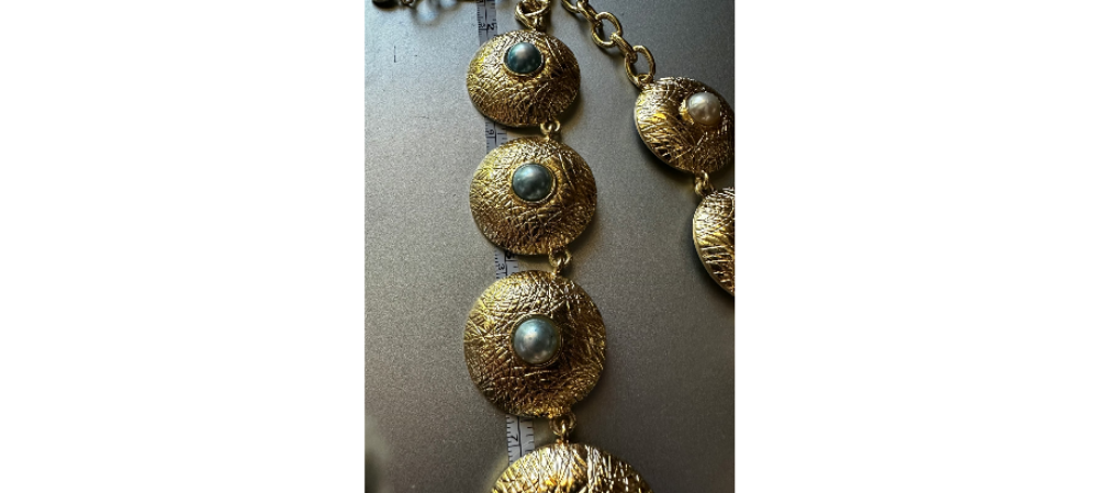 YLL WITH THE LABEL Gold 14" coin shaped necklace or belt.