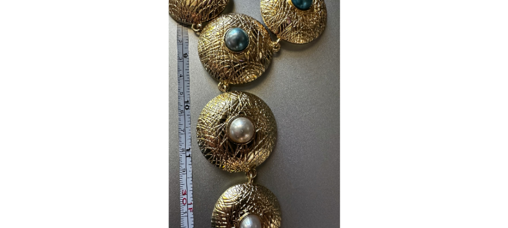 YLL WITH THE LABEL Gold 14" coin shaped necklace or belt.