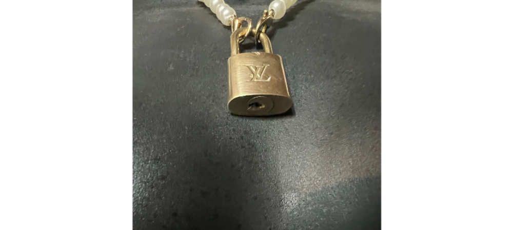 Louis Vuitton Brass Lock.
