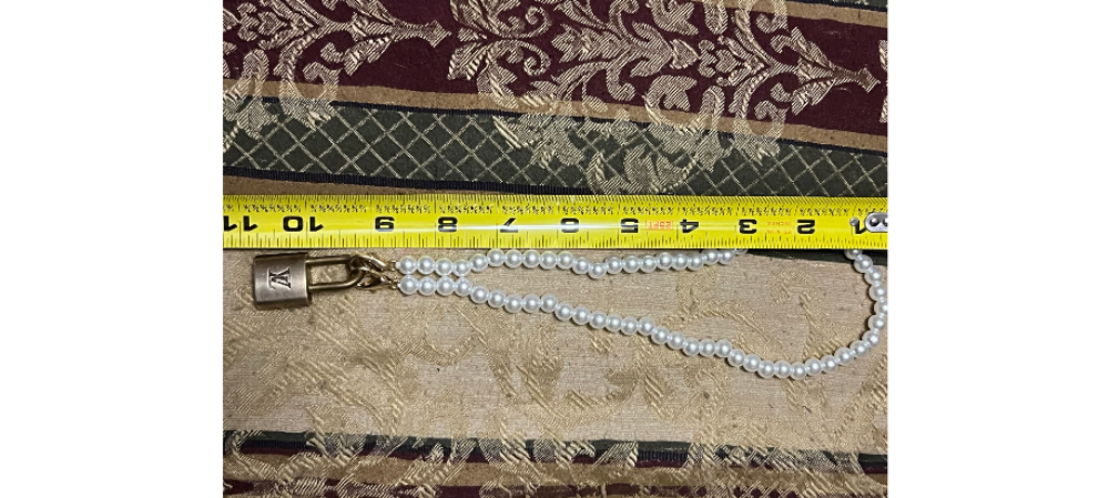 Louis Vuitton Brass Lock.