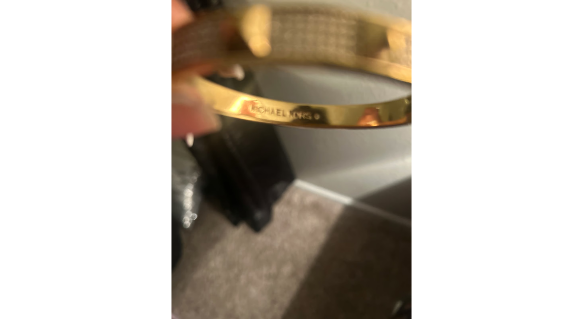 Michael Kors Modernist gold signed Bracelet.